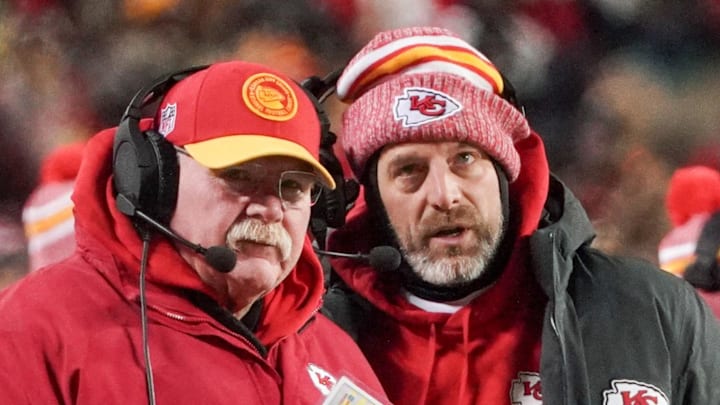Jan 13, 2024; Kansas City, Missouri, USA; Kansas City Chiefs head coach Andy Reid  talks with offensive coordinator Matt Nagy (right) against the Miami Dolphins  in a 2024 AFC wild card game at GEHA Field at Arrowhead Stadium. Mandatory Credit: Denny Medley-Imagn Images