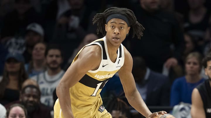 Nov 19, 2025; Minneapolis, Minnesota, USA; Washington Wizards guard Tre Johnson (12) dribbles the ball against the Minnesota Timberwolves in the second half at Target Center. Mandatory Credit: Jesse Johnson-Imagn Images