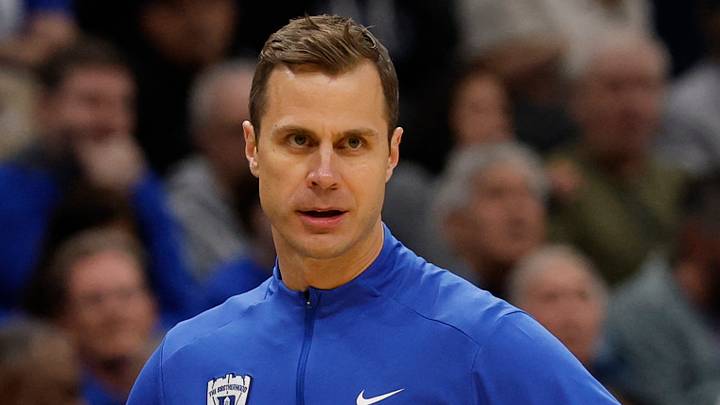 Mar 29, 2026; Washington, DC, USA; Duke Blue Devils head coach Jon Scheyer looks on against the UConn Huskies in the first half during an Elite Eight game of the East Regional of the men's 2026 NCAA Tournament at Capital One Arena. Mandatory Credit: Geoff Burke-Imagn Images Mar 29, 2026; Washington, DC, USA; Duke Blue Devils head coach Jon Scheyer looks on against the UConn Huskies in the first half during an Elite Eight game of the East Regional of the men's 2026 NCAA Tournament at Capital One Arena. Mandatory Credit: Geoff Burke-Imagn Images