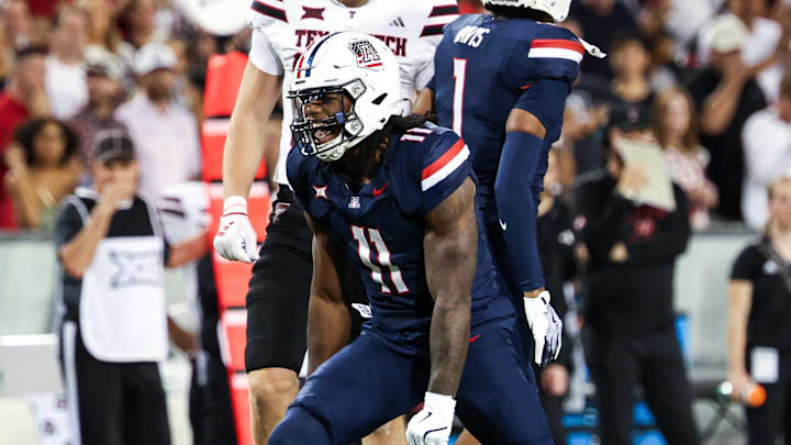 Oct 5, 2024; Tucson, Arizona, USA; Arizona Wildcats defensive lineman Chase Kennedy (11) celebrates tackle against Texas Tech Red Raiders during first quarter at Arizona Stadium. Mandatory Credit: Aryanna Frank-Imagn Images Oct 5, 2024; Tucson, Arizona, USA; Arizona Wildcats defensive lineman Chase Kennedy (11) celebrates tackle against Texas Tech Red Raiders during first quarter at Arizona Stadium. Mandatory Credit: Aryanna Frank-Imagn Images