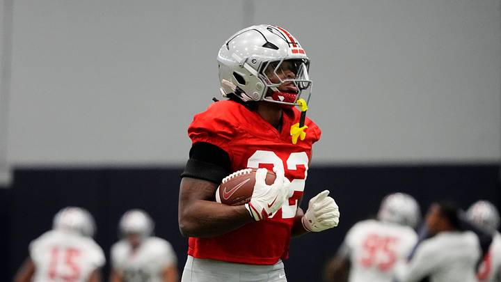 Ohio State Buckeyes running back Isaiah West (32) runs during practice at Highland Park High School in Dallas prior to the College Football Playoff matchup against the Miami (FL) Hurricanes on Dec. 29, 2025. Ohio State Buckeyes running back Isaiah West (32) runs during practice at Highland Park High School in Dallas prior to the College Football Playoff matchup against the Miami (FL) Hurricanes on Dec. 29, 2025.