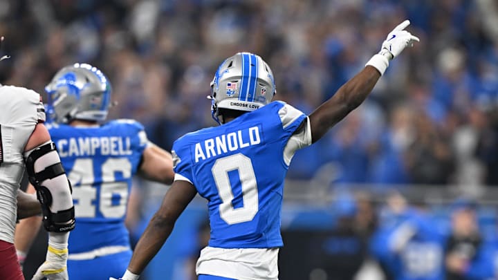 Detroit Lions corner back Terrion Arnold (0) celebrates after a fourth down stop against the Washington Commanders