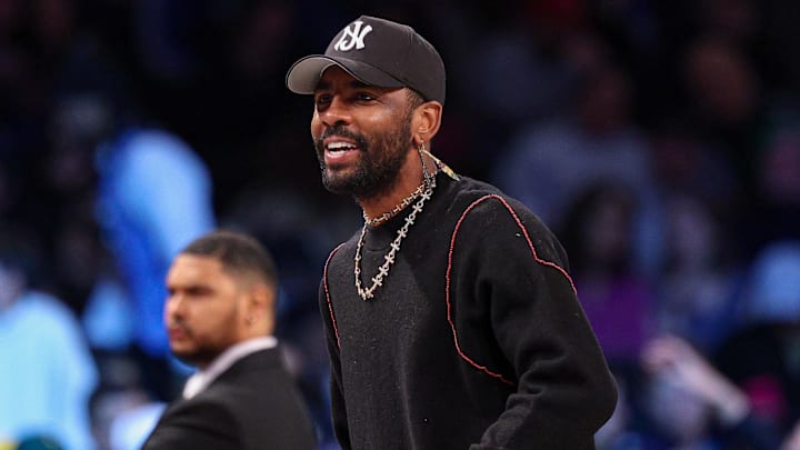 Mar 24, 2025; Brooklyn, New York, USA; Dallas Mavericks guard Kyrie Irving (11) looks on during the first quarter against the Brooklyn Nets at Barclays Center. Mandatory Credit: Vincent Carchietta-Imagn Images
