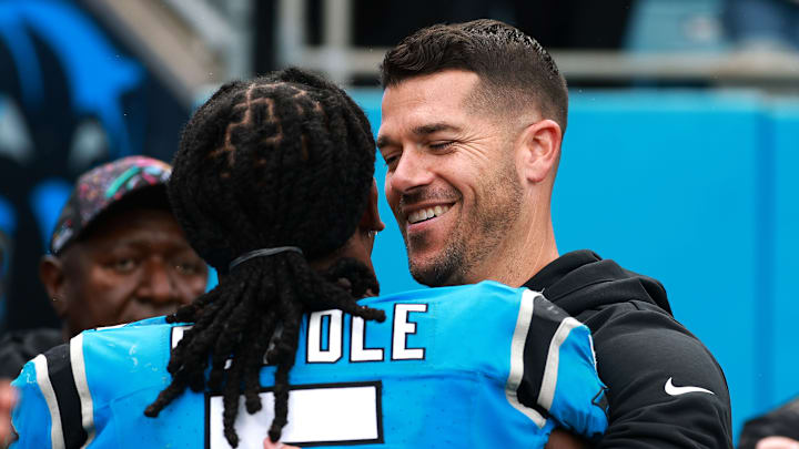 Carolina Panthers head coach Dave Canales and running back Rico Dowdle