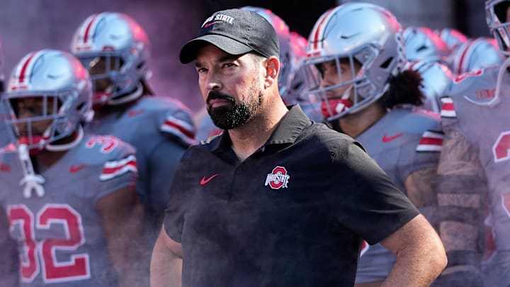 Oct 5, 2024; Columbus, OH, USA; Ohio State Buckeyes head coach Ryan Day prepares to lead his team on the field prior to the NCAA football game against the Iowa Hawkeyes at Ohio Stadium.
