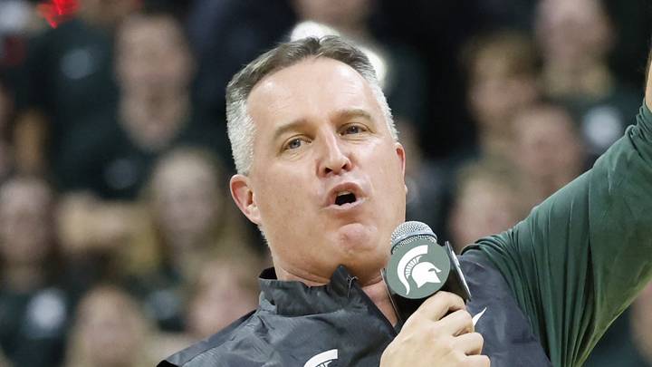 Michigan State Spartans head football coach Pat Fitzgerald addresses the crowd during a men's basketball game against the Iowa Hawkeyes on Tuesday, Dec. 2, 2025. Fitzgerald had been formally introduced earlier that day. Michigan State Spartans head football coach Pat Fitzgerald addresses the crowd during a men's basketball game against the Iowa Hawkeyes on Tuesday, Dec. 2, 2025. Fitzgerald had been formally introduced earlier that day.