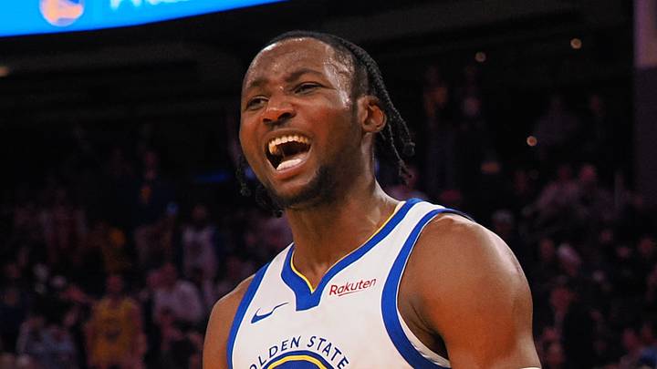 Golden State Warriors forward Jonathan Kuminga (00) reacts after a dunk against the Portland Trail Blazers during the fourth quarter at Chase Center on December 6, 2023.