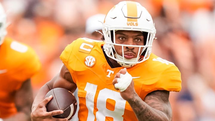 Tennessee running back DeSean Bishop (18) runs with the ball during Tennessee's home opener against ETSU at Neyland Stadium in Knoxville, Tenn., on Sept. 6, 2025.
