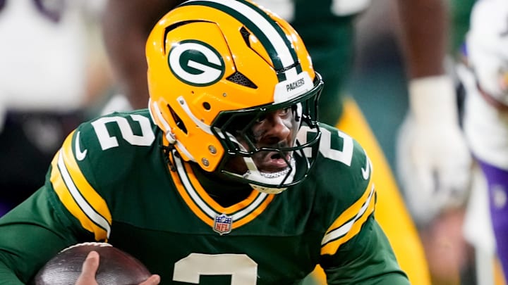 Green Bay Packers quarterback Malik Willis (2) runs the ball during the game against the Baltimore Ravens at Lambeau Field. 