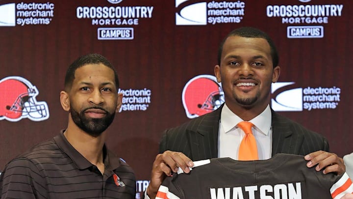Cleveland Browns quarterback Deshaun Watson, center, poses for a portrait with general manager Andrew Berry, left, and coach Kevin Stefanski during Watson's introductory news conference March 26, 2022, in Berea.