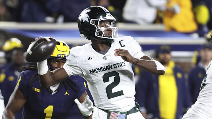 Oct 26, 2024; Ann Arbor, Michigan, USA;  Michigan State Spartans quarterback Aidan Chiles (2) passes in the second half against the Michigan Wolverines at Michigan Stadium. Mandatory Credit: Rick Osentoski-Imagn Images