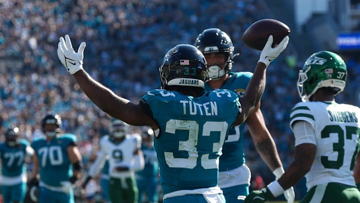 Jacksonville Jaguars running back Bhayshul Tuten (33) celebrates his touchdown in second quarter during an NFL football game at EverBank Stadium, Sunday, Dec. 14, 2025, in Jacksonville, Fla. [Doug Engle/Florida Times-Union]