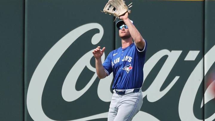 Mar 1, 2025; North Port, Florida, USA; Toronto Blue Jays outfielder RJ Schreck (89) catches a fly ball during the sixth inning against the Atlanta Braves at CoolToday Park. Mandatory Credit: Kim Klement Neitzel-Imagn Images
