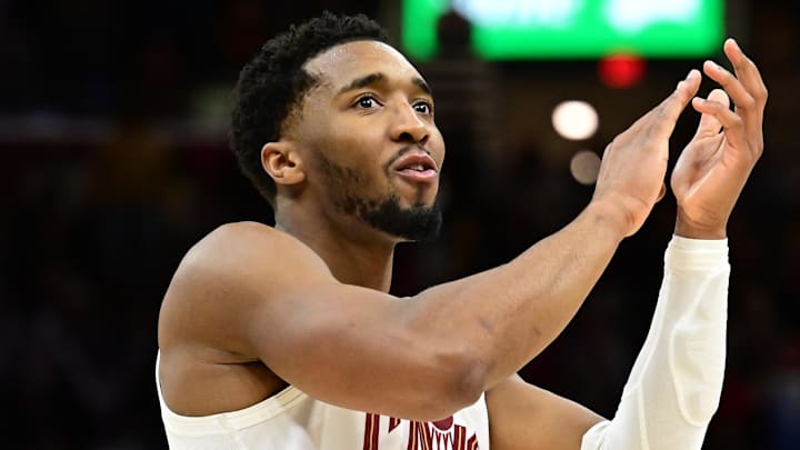Jan 8, 2025; Cleveland, Ohio, USA; Cleveland Cavaliers guard Donovan Mitchell (45) celebrates during the second half against the Oklahoma City Thunder at Rocket Mortgage FieldHouse. Mandatory Credit: Ken Blaze-Imagn Images