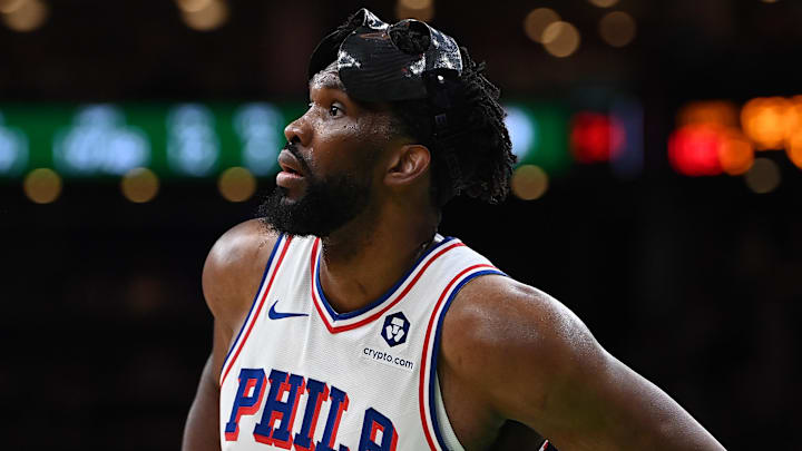 Dec 25, 2024; Boston, Massachusetts, USA; Philadelphia 76ers center Joel Embiid (21) waits during a timeout during the second half against the Boston Celtics at TD Garden. Mandatory Credit: Eric Canha-Imagn Images