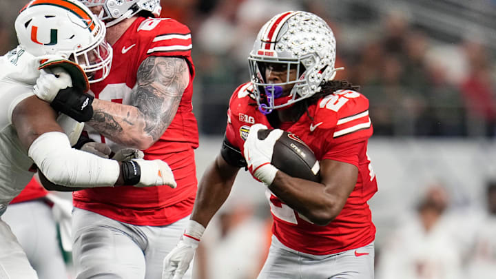Ohio State Buckeyes running back Bo Jackson (25) runs during the Cotton Bowl at AT&T Stadium in Arlington, Texas for the College Football Playoff quarterfinal game against the Miami Hurricanes on Dec. 31, 2025. Ohio State lost 24-14.