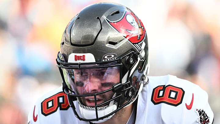 Dec 21, 2025; Charlotte, North Carolina, USA; Tampa Bay Buccaneers quarterback Baker Mayfield (6) at the line of scrimmage in the third quarter at Bank of America Stadium. Mandatory Credit: Bob Donnan-Imagn Images