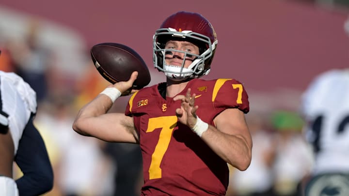 Oct 12, 2024; Los Angeles, California, USA; USC Trojans quarterback Miller Moss (7) throws a pass against the Penn State Nittany Lions at United Airlines Field at Los Angeles Memorial Coliseum. Oct 12, 2024; Los Angeles, California, USA; USC Trojans quarterback Miller Moss (7) throws a pass against the Penn State Nittany Lions at United Airlines Field at Los Angeles Memorial Coliseum.