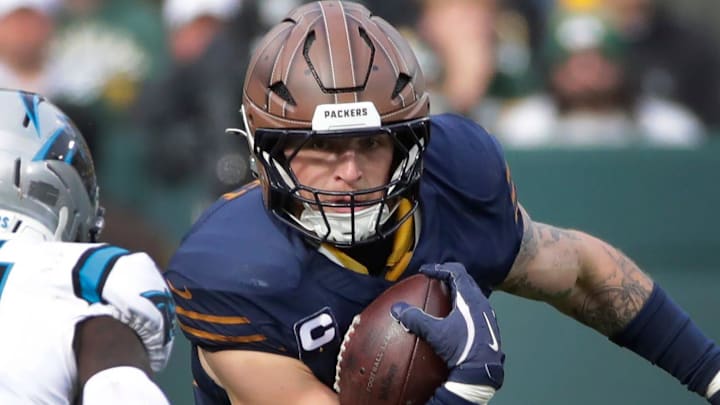 Green Bay Packers tight end Tucker Kraft (85) runs on a catch against Carolina Panthers safety Nick Scott (21) during their football game Sunday, November 2, 2025, at Lambeau Field in Green Bay, Wisconsin. Green Bay Packers tight end Tucker Kraft (85) runs on a catch against Carolina Panthers safety Nick Scott (21) during their football game Sunday, November 2, 2025, at Lambeau Field in Green Bay, Wisconsin.