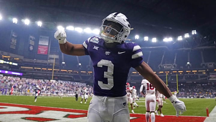 Kansas State running back Dylan Edwards (3) celebrates the go-ahead touchdown against Rutgers during the second half of the Rate Bowl at Chase Field on Dec. 26, 2024, in Phoenix.