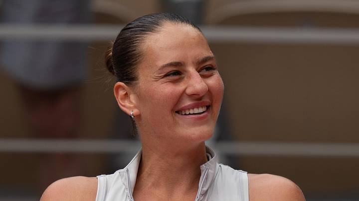 Marta Kostyuk celebrates winning her match
