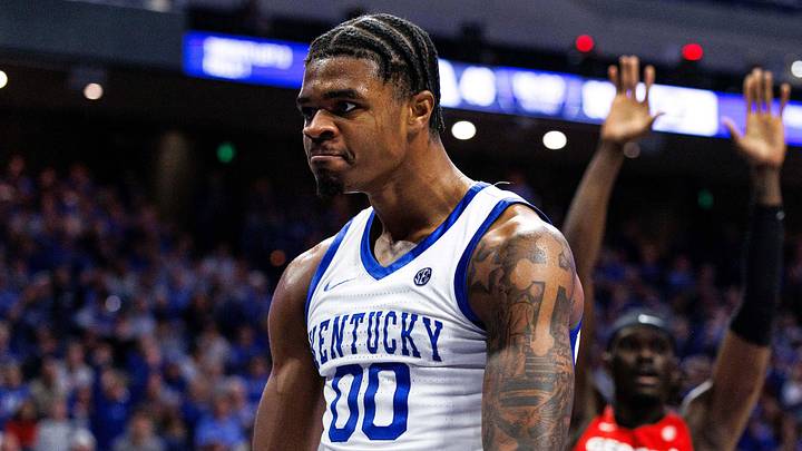 Feb 17, 2026; Lexington, Kentucky, USA; Kentucky Wildcats guard Otega Oweh (00) reacts after scoring a basket and being fouled during the second half against the Georgia Bulldog at Rupp Arena at Central Bank Center. Mandatory Credit: Jordan Prather-Imagn Images