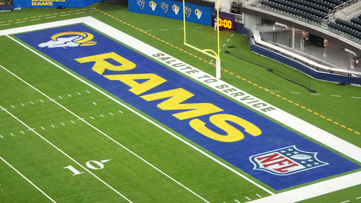Nov 11, 2024; Inglewood, California, USA; The Los Angeles Rams and Salute to Service logos in the end zone at SoFi Stadium. Mandatory Credit: Kirby Lee-Imagn Images