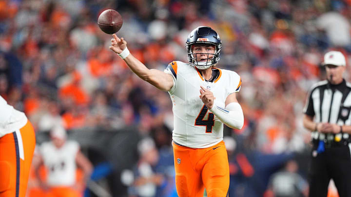 Aug 18, 2024; Denver, Colorado, USA; Denver Broncos quarterback Zach Wilson (4) passes the ball in the second half against the Green Bay Packers at Empower Field at Mile High. 