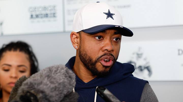 Dallas Cowboys defensive coordinator Christian Parker is interviewed after practice at the Ford Center. Dallas Cowboys defensive coordinator Christian Parker is interviewed after practice at the Ford Center.