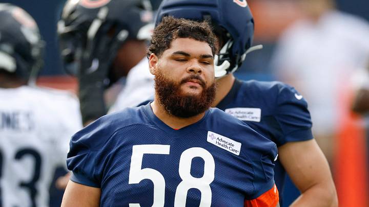 Jul 31, 2026; Lake Forest, IL, USA; Chicago Bears offensive tackle Darnell Wright (58) walks on he field during Training Camp at Halas Hall. Mandatory Credit: Kamil Krzaczynski-Imagn Images