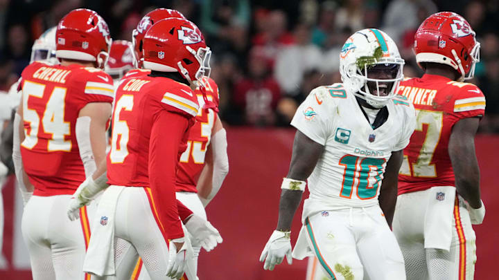 Nov 5, 2023; Frankfurt, Germany; Miami Dolphins wide receiver Tyreek Hill (10) celebrates after a reception against the Kansas City Chiefs during an NFL International Series game at Deutsche Bank Park. Mandatory Credit: Kirby Lee-Imagn Images