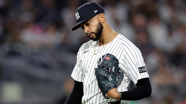 Apr 25, 2025; Bronx, New York, USA; New York Yankees relief pitcher Devin Williams (38) reacts as he walks off the field after being taken out of the game against the Toronto Blue Jays during the ninth inning at Yankee Stadium
