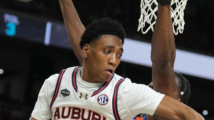 Apr 5, 2025; San Antonio, TX, USA;  Auburn Tigers guard Tahaad Pettiford (0) passes the ball against the Florida Gators in the semifinals of the men's Final Four of the 2025 NCAA Tournament at the Alamodome. Mandatory Credit: Robert Deutsch-Imagn Images