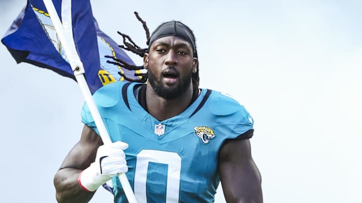 Nov 16, 2025; Jacksonville, Florida, USA; Jacksonville Jaguars linebacker Devin Lloyd (0) participates in pregame player introductions against the Los Angeles Chargers at EverBank Stadium. Mandatory Credit: Nathan Ray Seebeck-Imagn Images