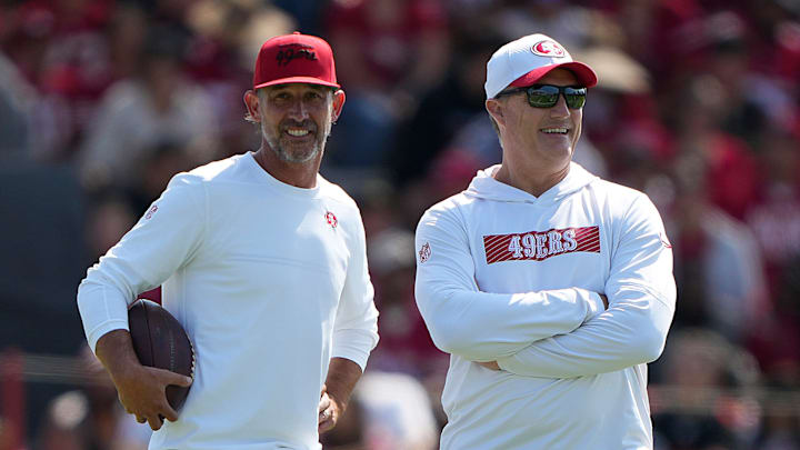 San Francisco 49ers head coach Kyle Shanahan (L) and general manager John Lynch (R)