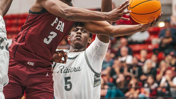 Jeremy Jackson (5) defends against FBA in the 2025 Florida Class 2A boys basketball state semifinals.