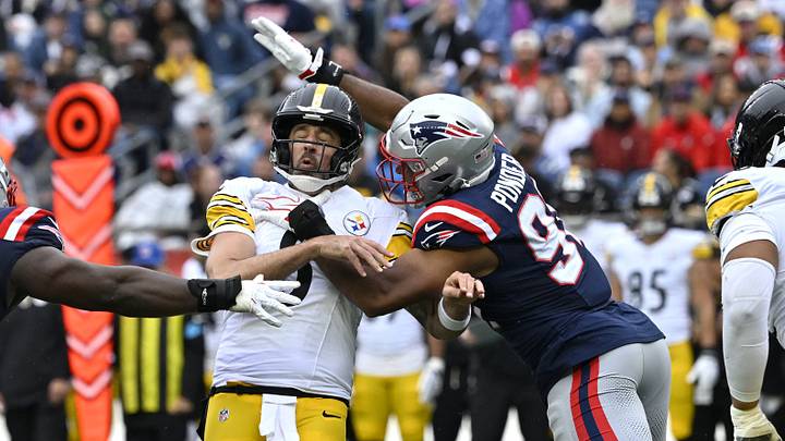 Sep 20, 2026; Foxborough, Massachusetts, USA; Pittsburgh Steelers quarterback Aaron Rodgers (8) is hit by New England Patriots linebacker Elijah Ponder (91) in the first half at Gillette Stadium. Mandatory Credit: Eric Canha-Imagn Images Sep 20, 2026; Foxborough, Massachusetts, USA; Pittsburgh Steelers quarterback Aaron Rodgers (8) is hit by New England Patriots linebacker Elijah Ponder (91) in the first half at Gillette Stadium. Mandatory Credit: Eric Canha-Imagn Images