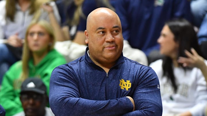 Jan 17, 2026; Blacksburg, Virginia, USA; Notre Dame Fighting Irish head coach Micah Shrewsberry looks at the official during the first half at Cassell Coliseum. 