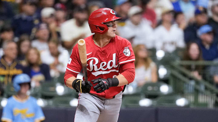 Sep 26, 2025; Milwaukee, Wisconsin, USA;  Cincinnati Reds center fielder TJ Friedl (29) hits a double during the third inning against the Milwaukee Brewers at American Family Field. Mandatory Credit: Jeff Hanisch-Imagn Images