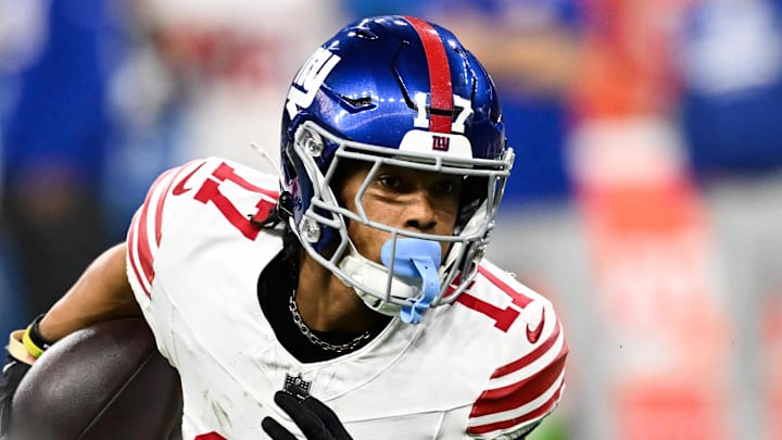 Nov 23, 2025; Detroit, Michigan, USA; New York Giants wide receiver Wan'Dale Robinson (17) runs upfield after catching a swing pass in the second quarter against the Detroit Lions at Ford Field. Mandatory Credit: Lon Horwedel-Imagn Images