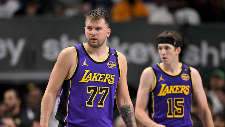 Apr 9, 2025; Dallas, Texas, USA; Los Angeles Lakers guard Luka Doncic (77) and guard Austin Reaves (15) during the game between the Dallas Mavericks and the Los Angeles Lakers at American Airlines Center. Mandatory Credit: Jerome Miron-Imagn Images