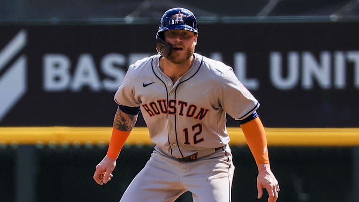 Sep 5, 2024; Cincinnati, Ohio, USA; Houston Astros outfielder Ben Gamel (12) leads off from first in the seventh inning against the Cincinnati Reds at Great American Ball Park.