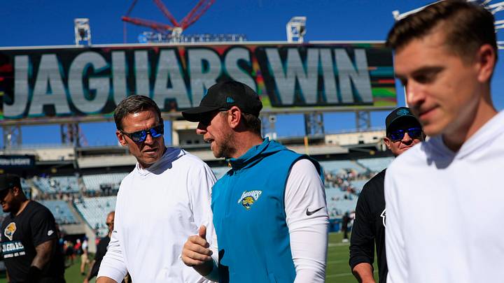 From left, Jacksonville Jaguars Executive Vice President of football operations Tony Boselli, head coach Liam Coen and general manager James Gladstone walk off the field after the game of an NFL football matchup at EverBank Stadium on Sunday, Sept. 27, 2026, in Jacksonville, Fla. The Jaguars defeated the Patriots 35-6. 