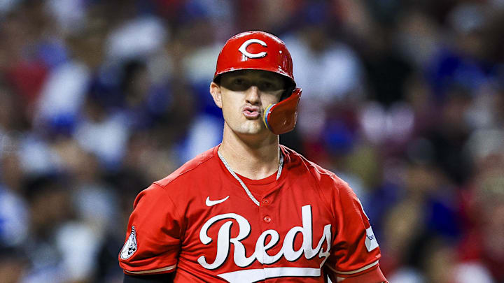 Jul 28, 2025; Cincinnati, Ohio, USA; Cincinnati Reds outfielder Austin Hays (12) reacts after a play in the eighth inning against the Los Angeles Dodgers at Great American Ball Park. Mandatory Credit: Katie Stratman-Imagn Images