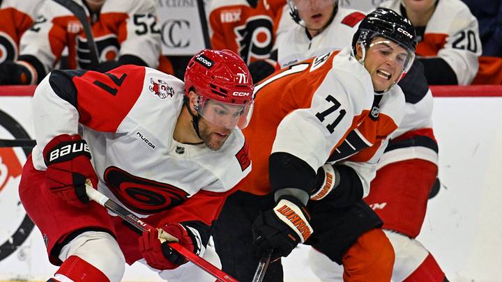 Oct 3, 2026; Philadelphia, Pennsylvania, USA; Carolina Hurricanes left wing Taylor Hall (71) and Philadelphia Flyers right wing Tyson Foerster (71) battle for the puck during the third period at Xfinity Mobile Arena. Mandatory Credit: Eric Hartline-Imagn Images