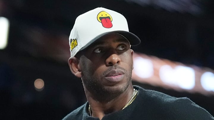 Dec 13, 2025; Las Vegas, Nevada, USA; Chris Paul watches during the Emirates NBA Cup semifinals game between the San Antonio Spurs and Oklahoma City Thunder at T-Mobile Arena. Mandatory Credit: Kirby Lee-Imagn Images