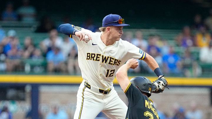 Aug 4, 2026; Milwaukee, Wisconsin, USA; Milwaukee Brewers right fielder Cooper Pratt (12) throws to first base against centerfielder Jake Mangum (28) in the first inning at American Family Field. Mangum was out on the play. Mandatory Credit: Michael McLoone-Imagn Images Aug 4, 2026; Milwaukee, Wisconsin, USA; Milwaukee Brewers right fielder Cooper Pratt (12) throws to first base against centerfielder Jake Mangum (28) in the first inning at American Family Field. Mangum was out on the play. Mandatory Credit: Michael McLoone-Imagn Images