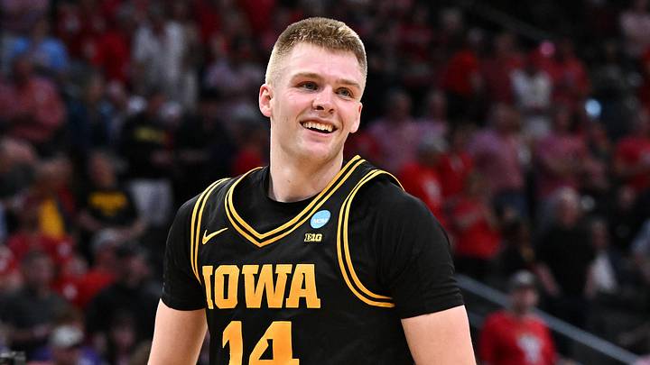 Mar 26, 2026; Houston, TX, USA;Iowa Hawkeyes guard Bennett Stirtz (14) reacts after beating the Nebraska Cornhuskers during a Sweet Sixteen game of the South Regional of the men's 2026 NCAA Tournament at Toyota Center. Mandatory Credit: Maria Lysaker-Imagn Images