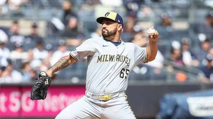 Mar 29, 2025; Bronx, New York, USA; Milwaukee Brewers starting pitcher Nestor Cortes (65) pitches in the first inning against the New York Yankees at Yankee Stadium.