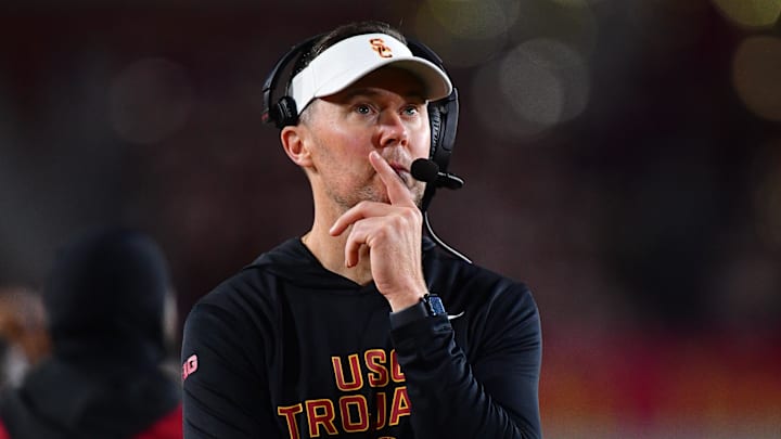 Nov 7, 2025; Los Angeles, California, USA; Southern California Trojans head coach Lincoln Riley watches game action against the Northwestern Wildcats during the second half at the Los Angeles Memorial Coliseum. Mandatory Credit: Gary A. Vasquez-Imagn Images